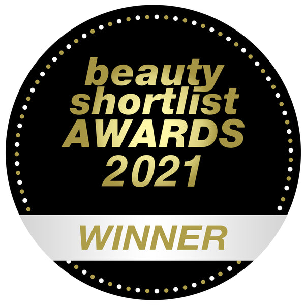 'Beauty Shortlist Awards 2021 winner badge with gold text on black background.'